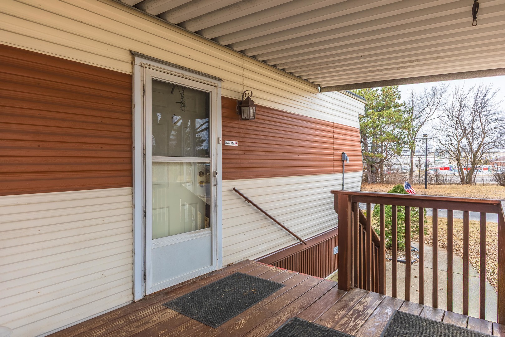 7 Oak Valley Road Bloomington, IL 61704 - Photo 20 of 27 a view of a balcony with furniture and wooden deck