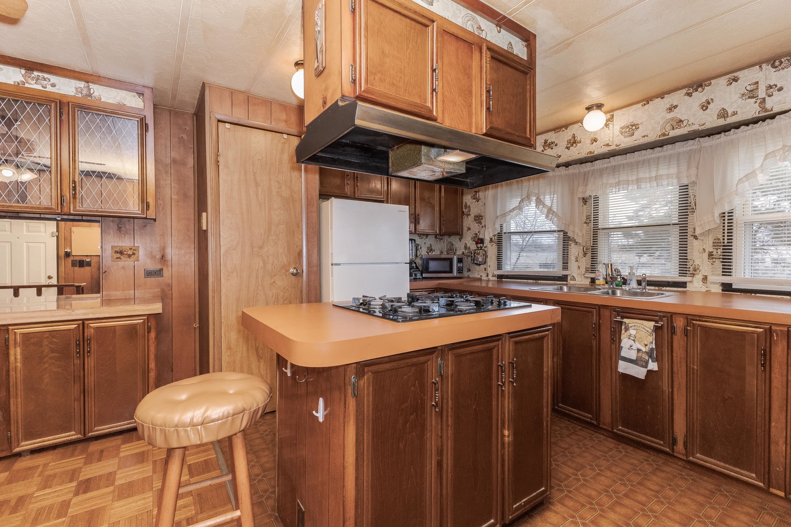 7 Oak Valley Road Bloomington, IL 61704 - Photo 2 of 27 a kitchen with stainless steel appliances granite countertop a sink a stove and a refrigerator