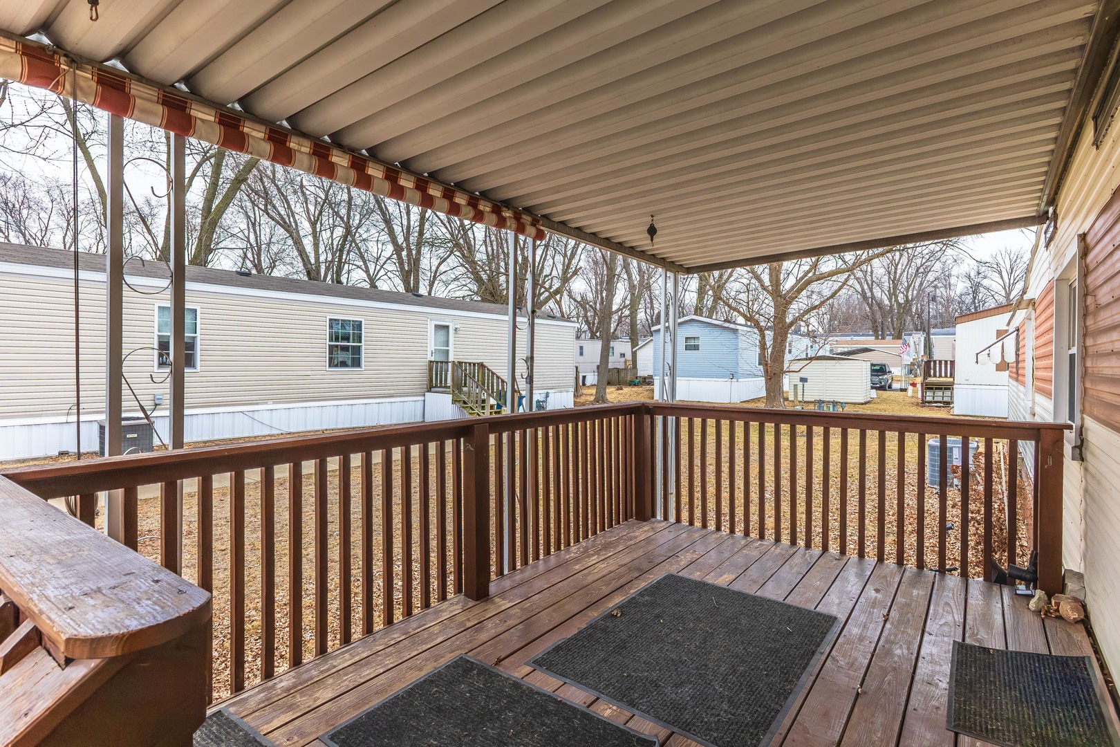 7 Oak Valley Road Bloomington, IL 61704 - Photo 21 of 27 a view of a two chairs in the balcony