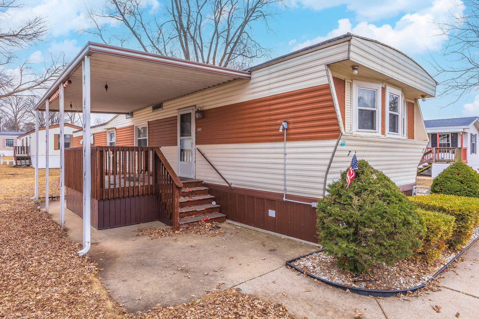 7 Oak Valley Road Bloomington, IL 61704 - Photo 22 of 27 a view of a house with a patio