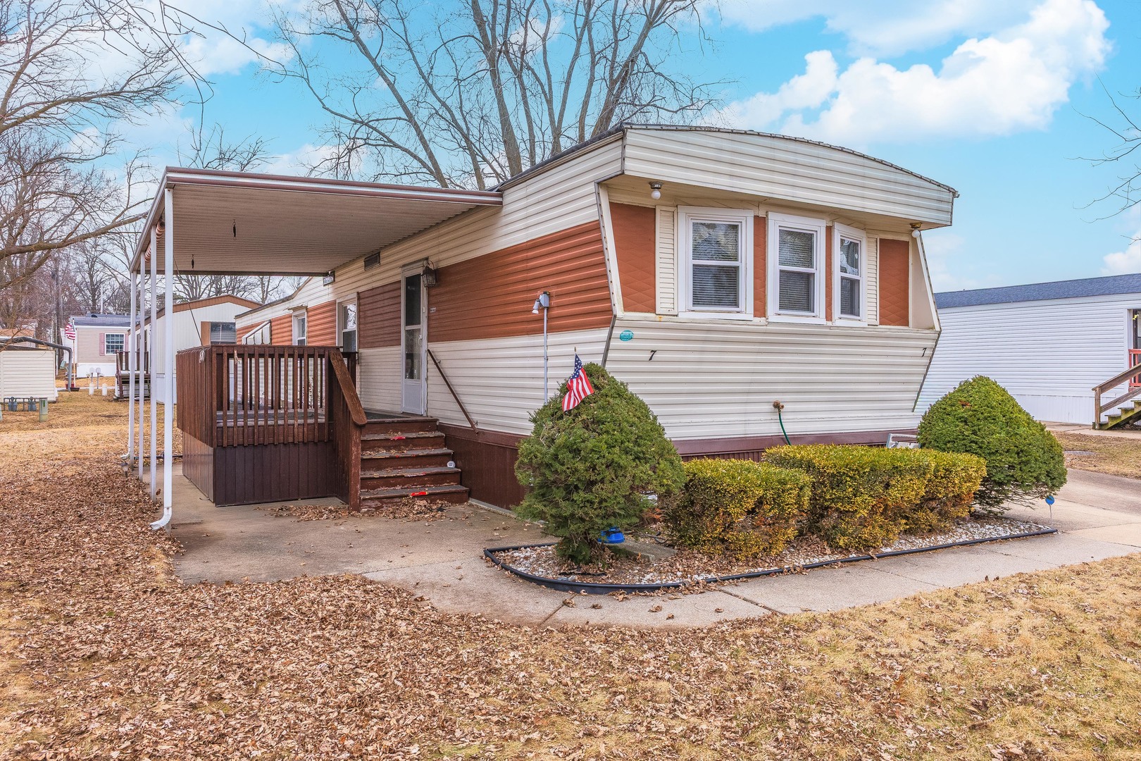7 Oak Valley Road Bloomington, IL 61704 - Photo 23 of 27 a view of a house with a yard