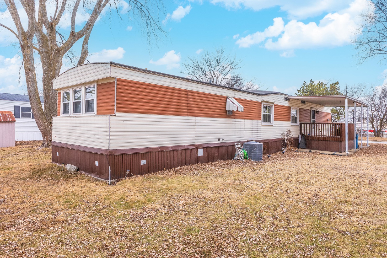 7 Oak Valley Road Bloomington, IL 61704 - Photo 24 of 27 a view of a house with a yard