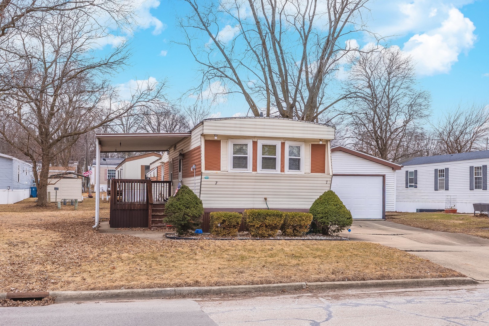 7 Oak Valley Road Bloomington, IL 61704 - Photo 27 of 27 a front view of a house with garden