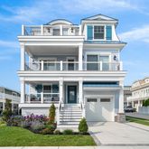 front view of a building with a yard