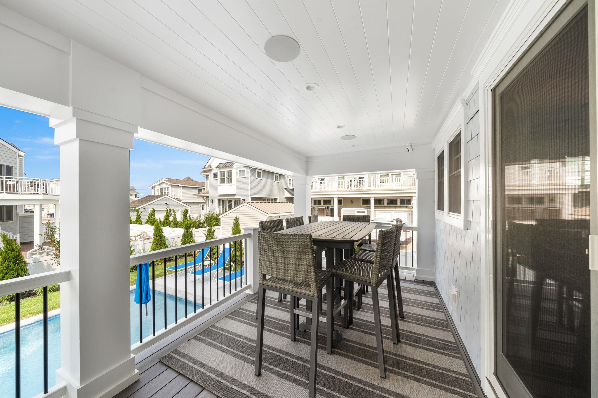 75 24th Street East Avalon, NJ 08202 - Photo 11 of 47 a view of a dining room with furniture window and wooden floor