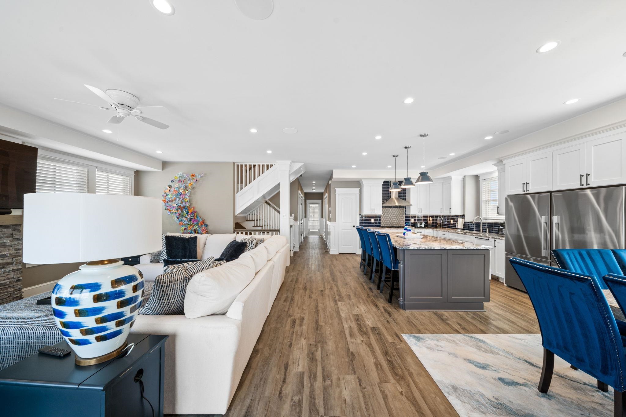 75 24th Street East Avalon, NJ 08202 - Photo 16 of 47 a living room with stainless steel appliances furniture and a kitchen view