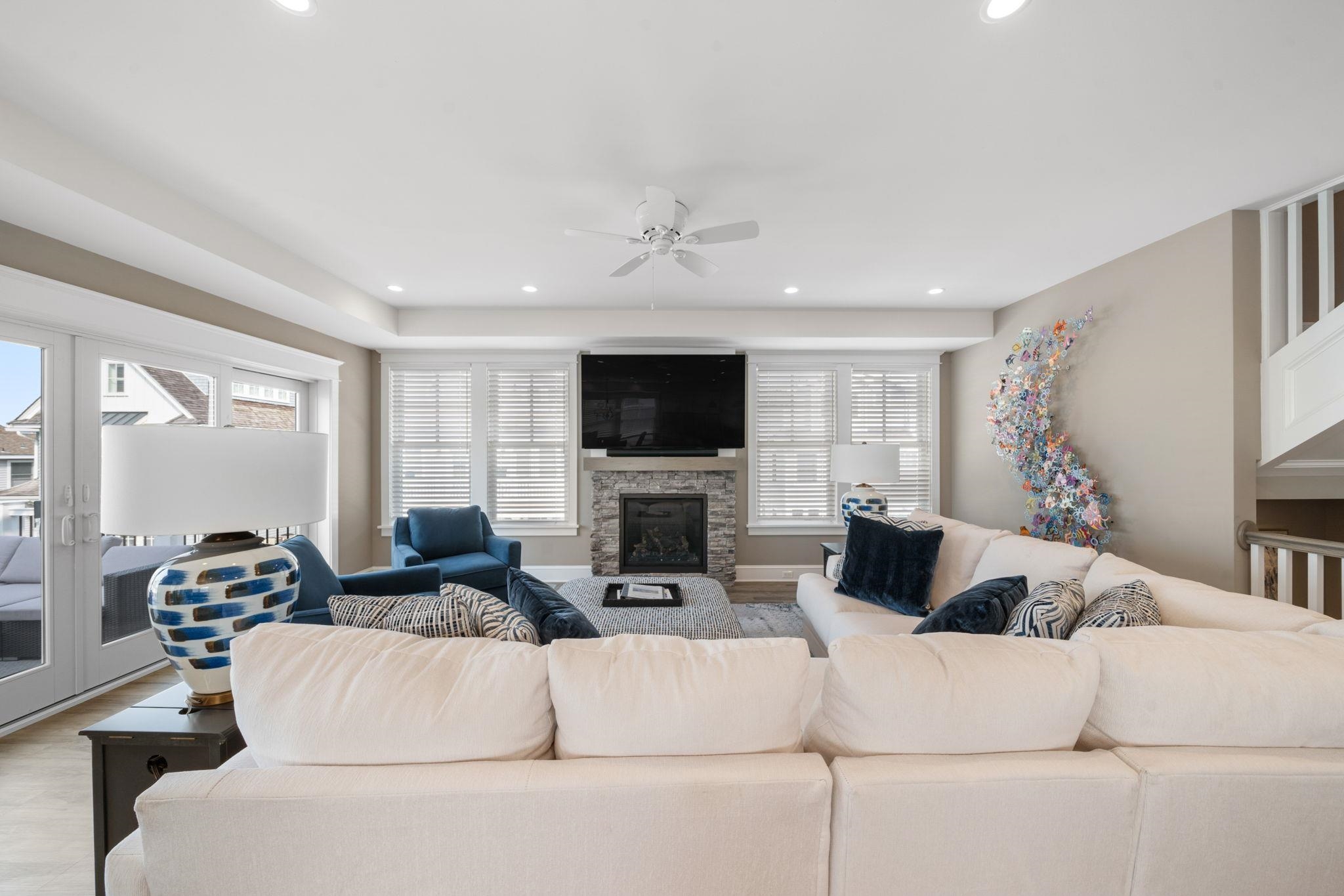 75 24th Street East Avalon, NJ 08202 - Photo 19 of 47 a living room with furniture and a flat screen tv
