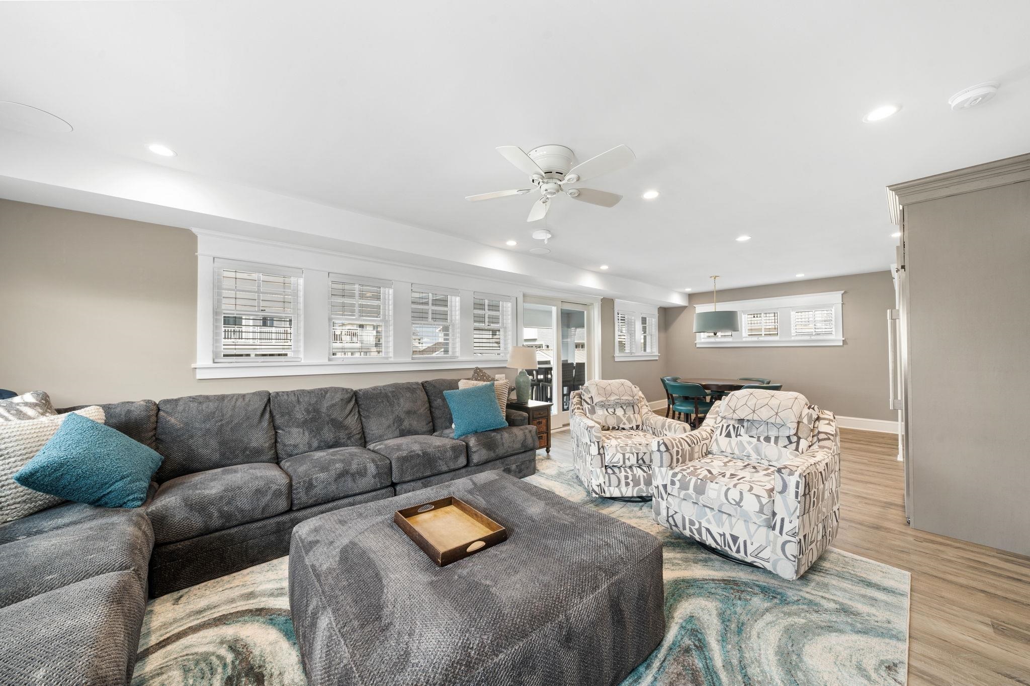 75 24th Street East Avalon, NJ 08202 - Photo 27 of 47 a living room with furniture and wooden floor