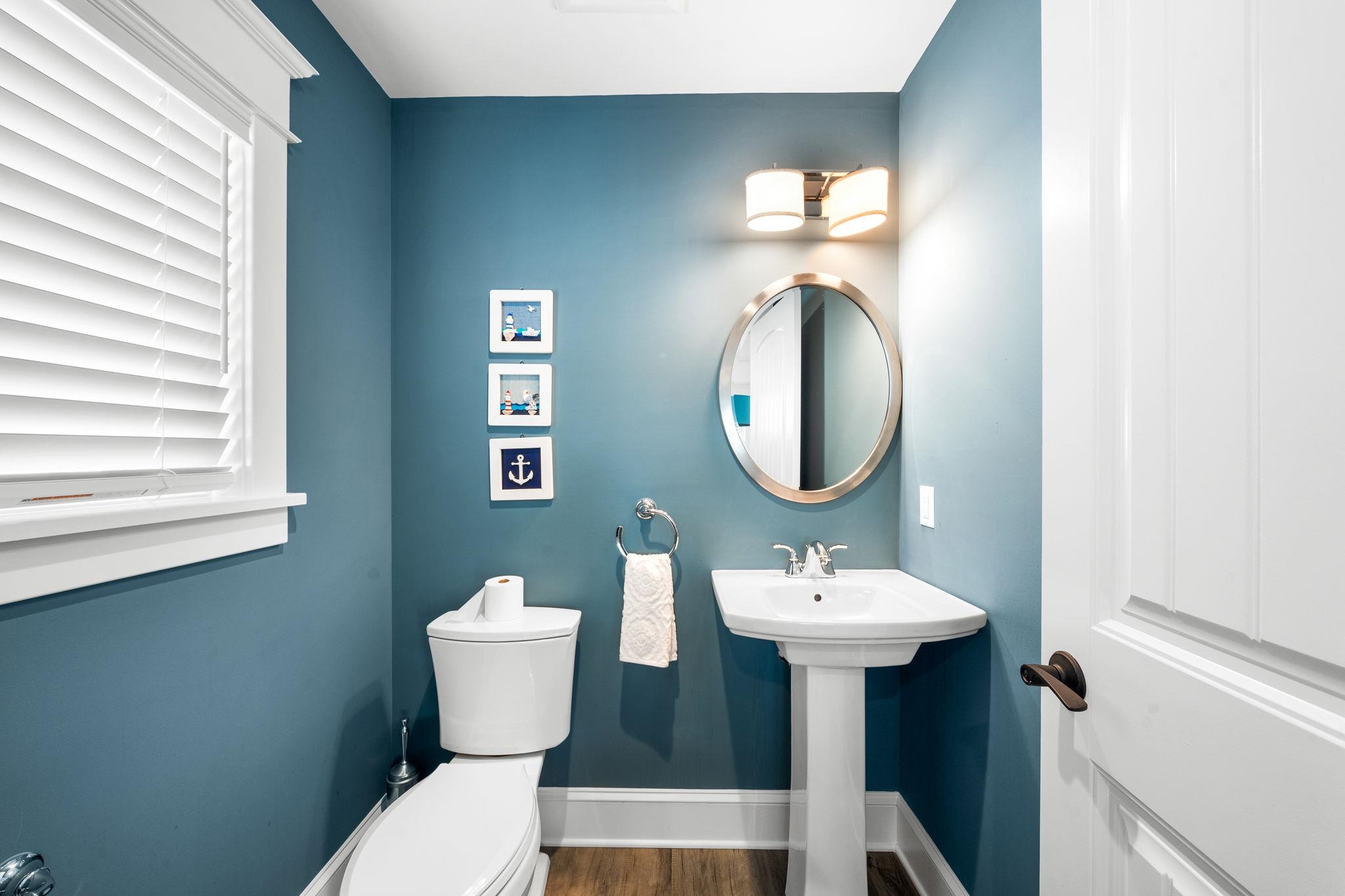 75 24th Street East Avalon, NJ 08202 - Photo 28 of 47 a bathroom with a toilet sink and mirror