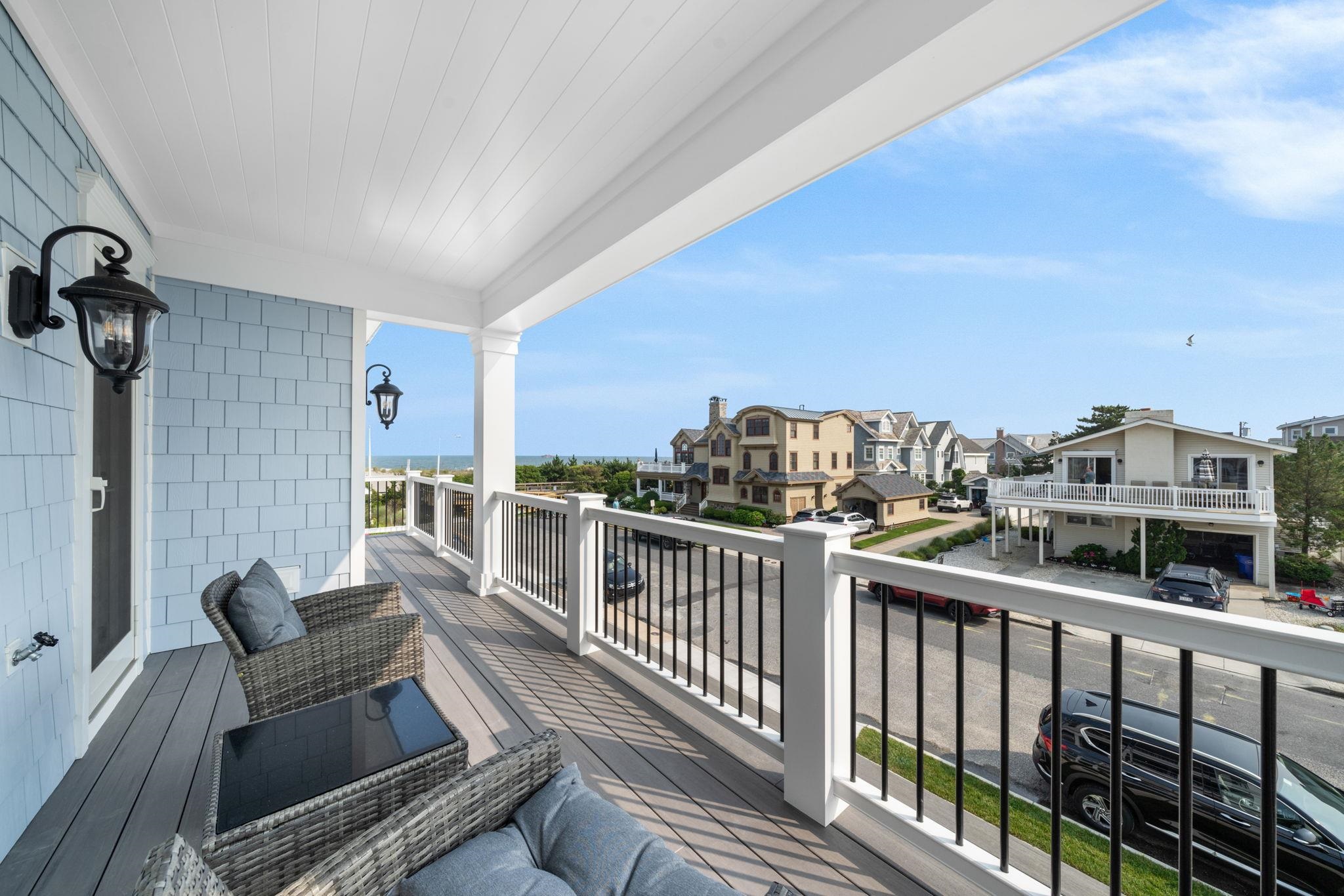 75 24th Street East Avalon, NJ 08202 - Photo 32 of 47 a view of a balcony with furniture
