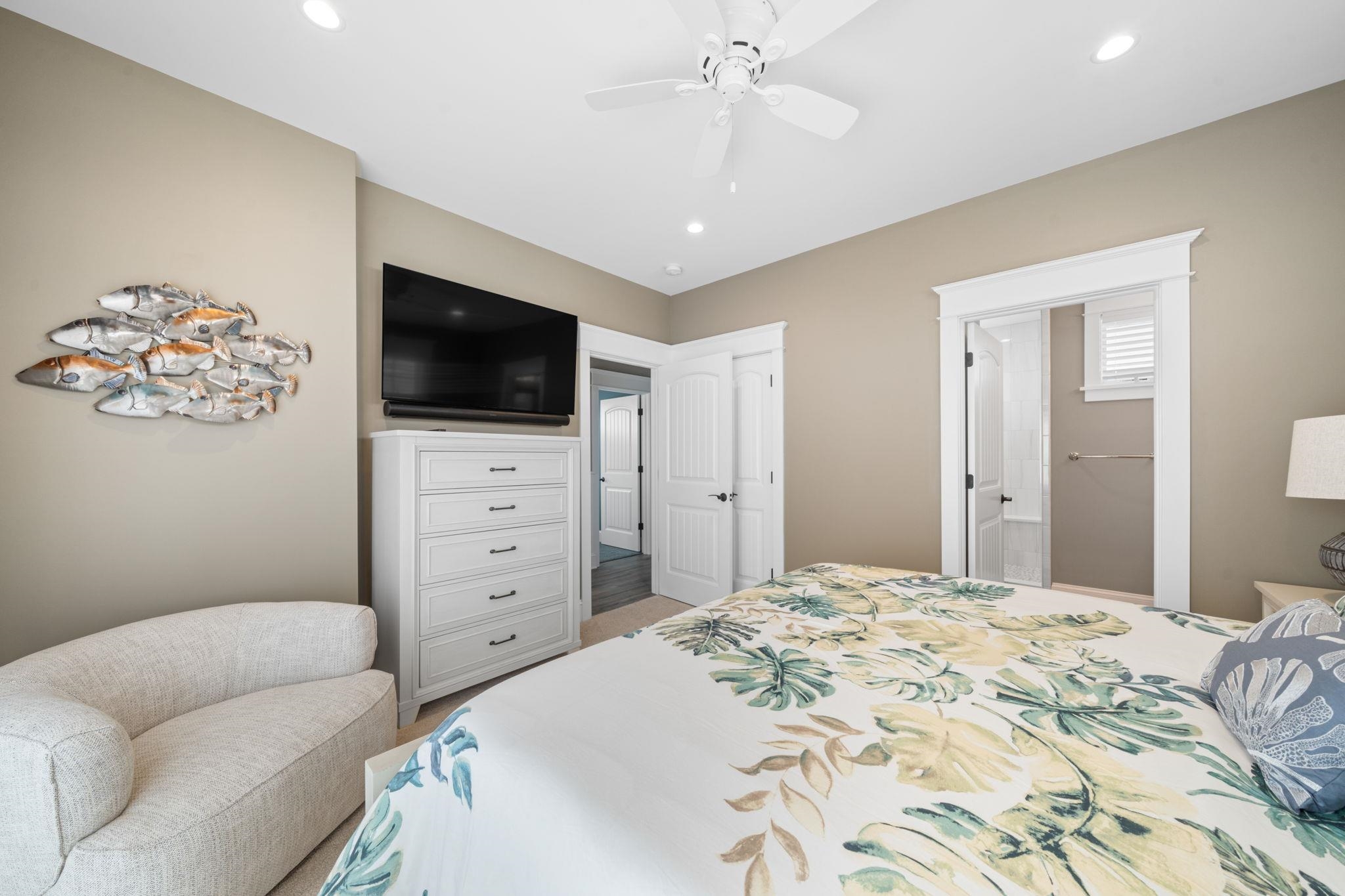 75 24th Street East Avalon, NJ 08202 - Photo 35 of 47 a bedroom with a bed and a flat screen tv
