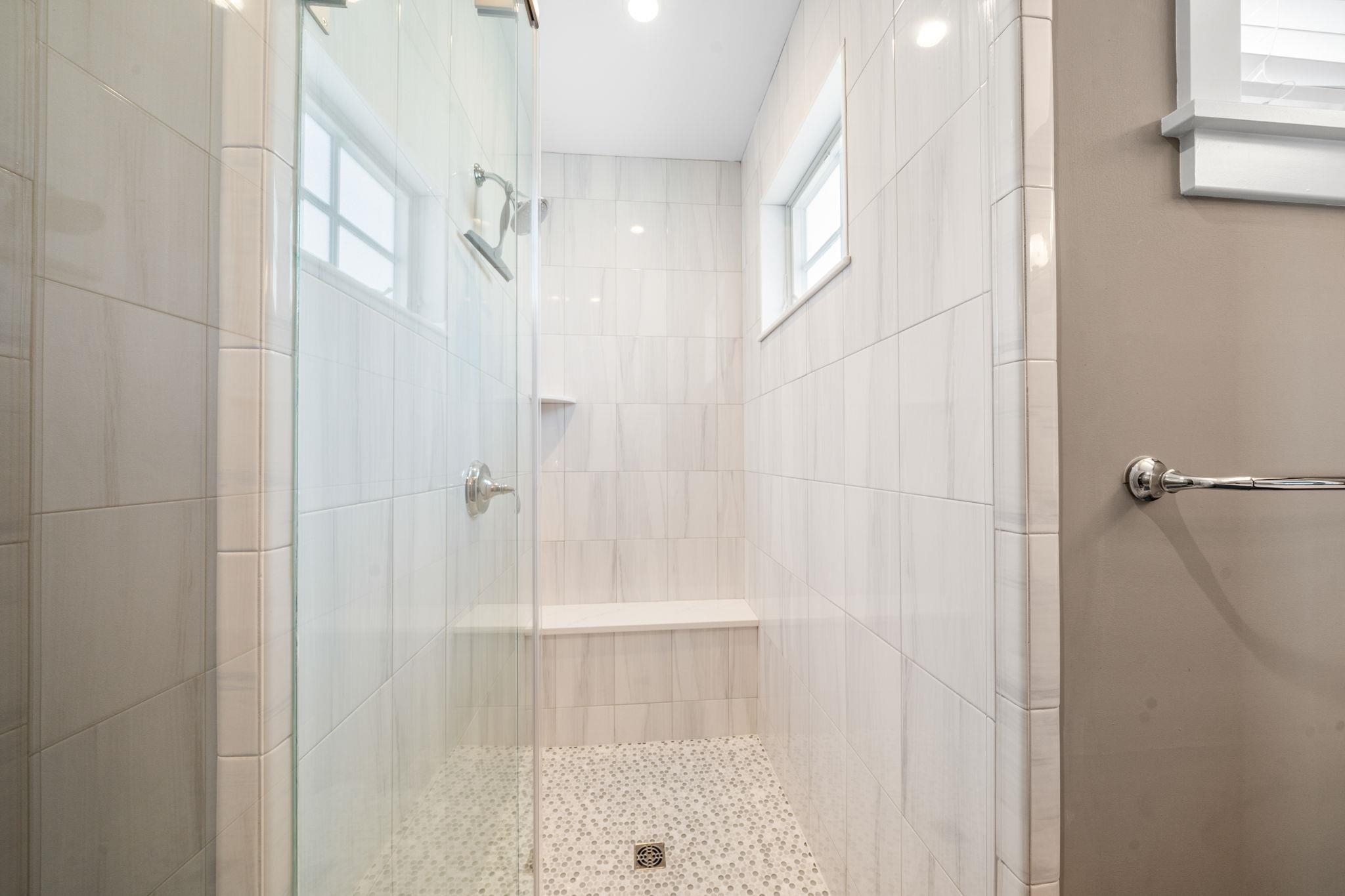75 24th Street East Avalon, NJ 08202 - Photo 37 of 47 a bathroom with a glass shower door