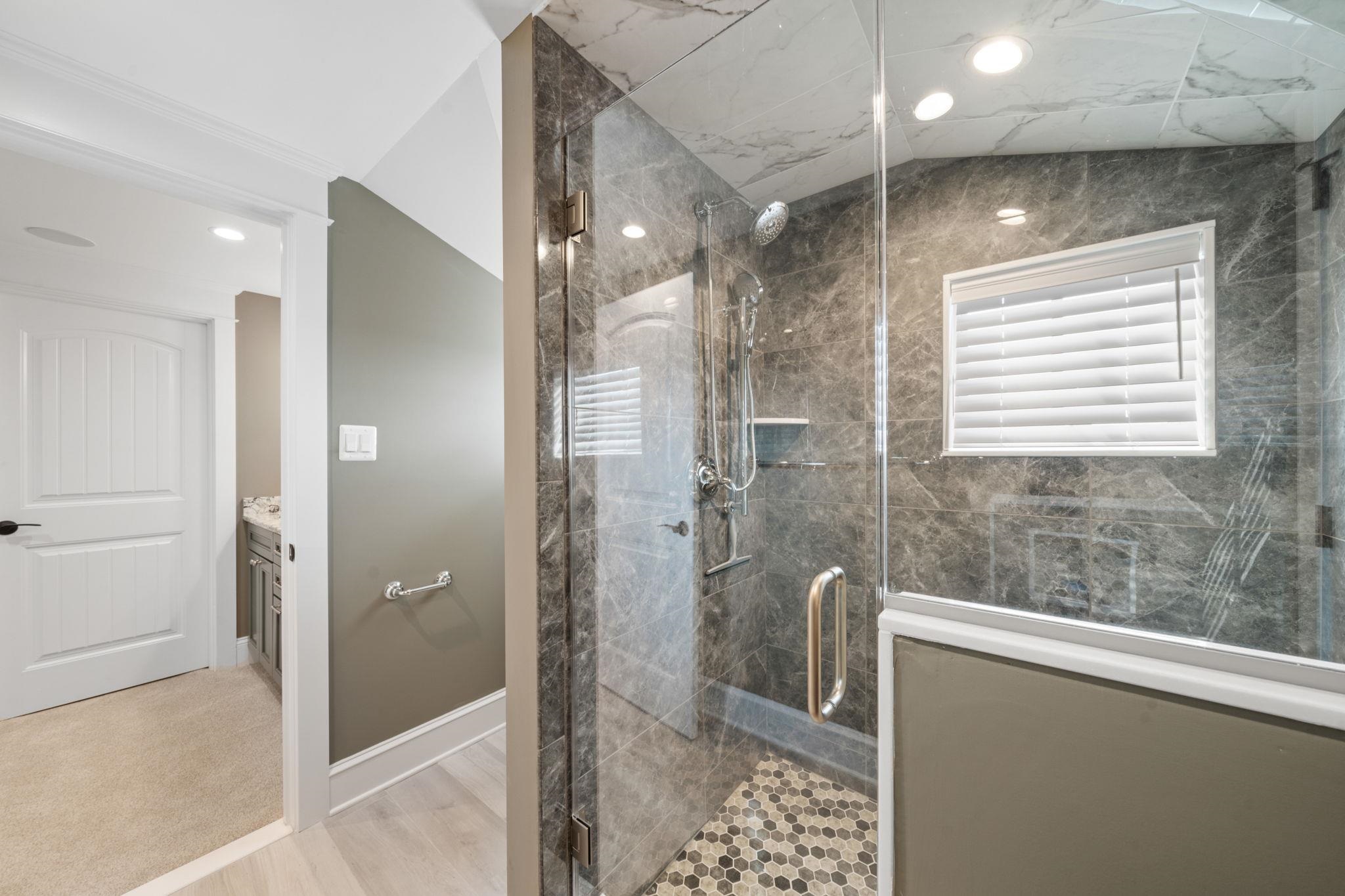 75 24th Street East Avalon, NJ 08202 - Photo 39 of 47 a bathroom with a shower and a sink