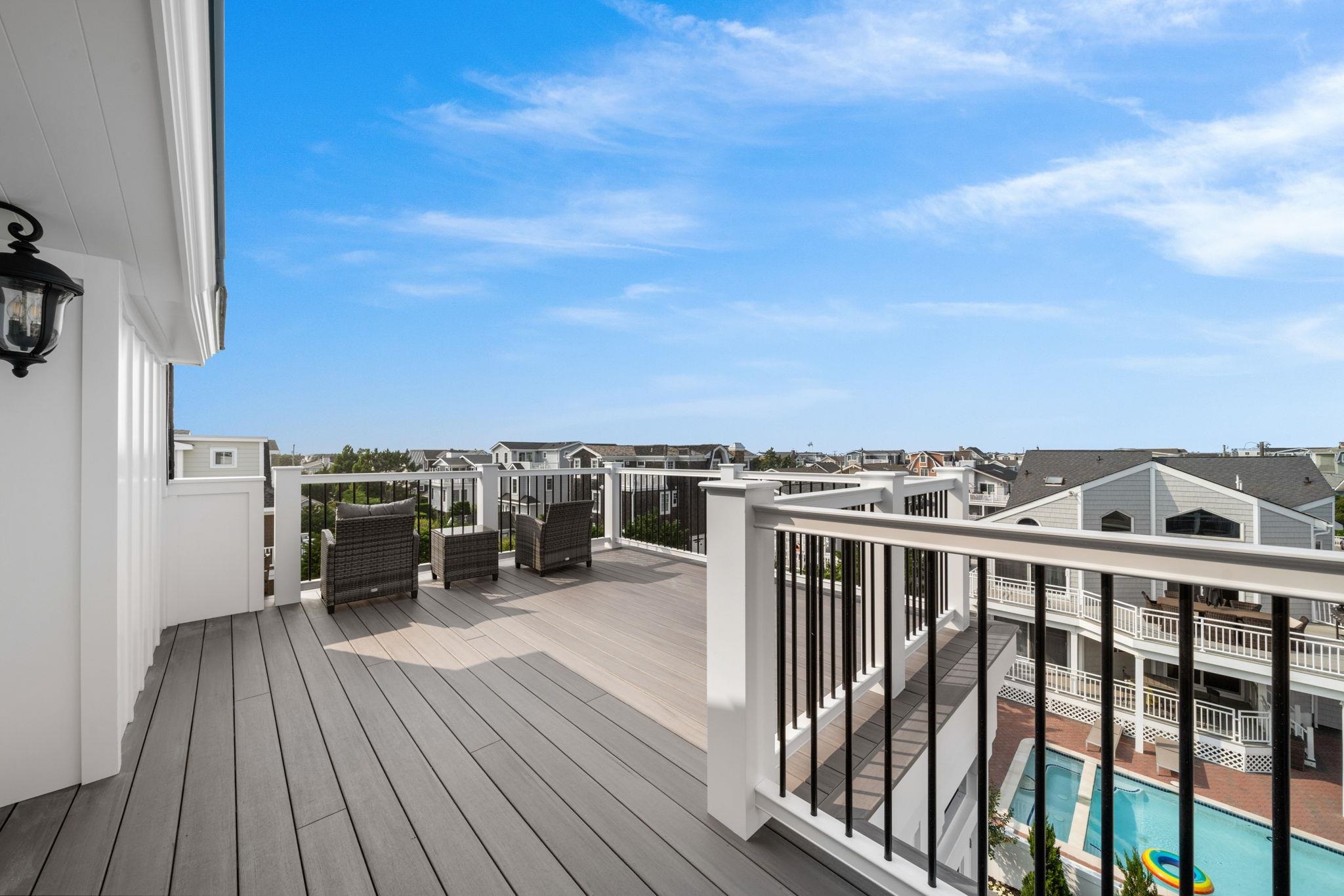 75 24th Street East Avalon, NJ 08202 - Photo 41 of 47 a view of a balcony with chairs