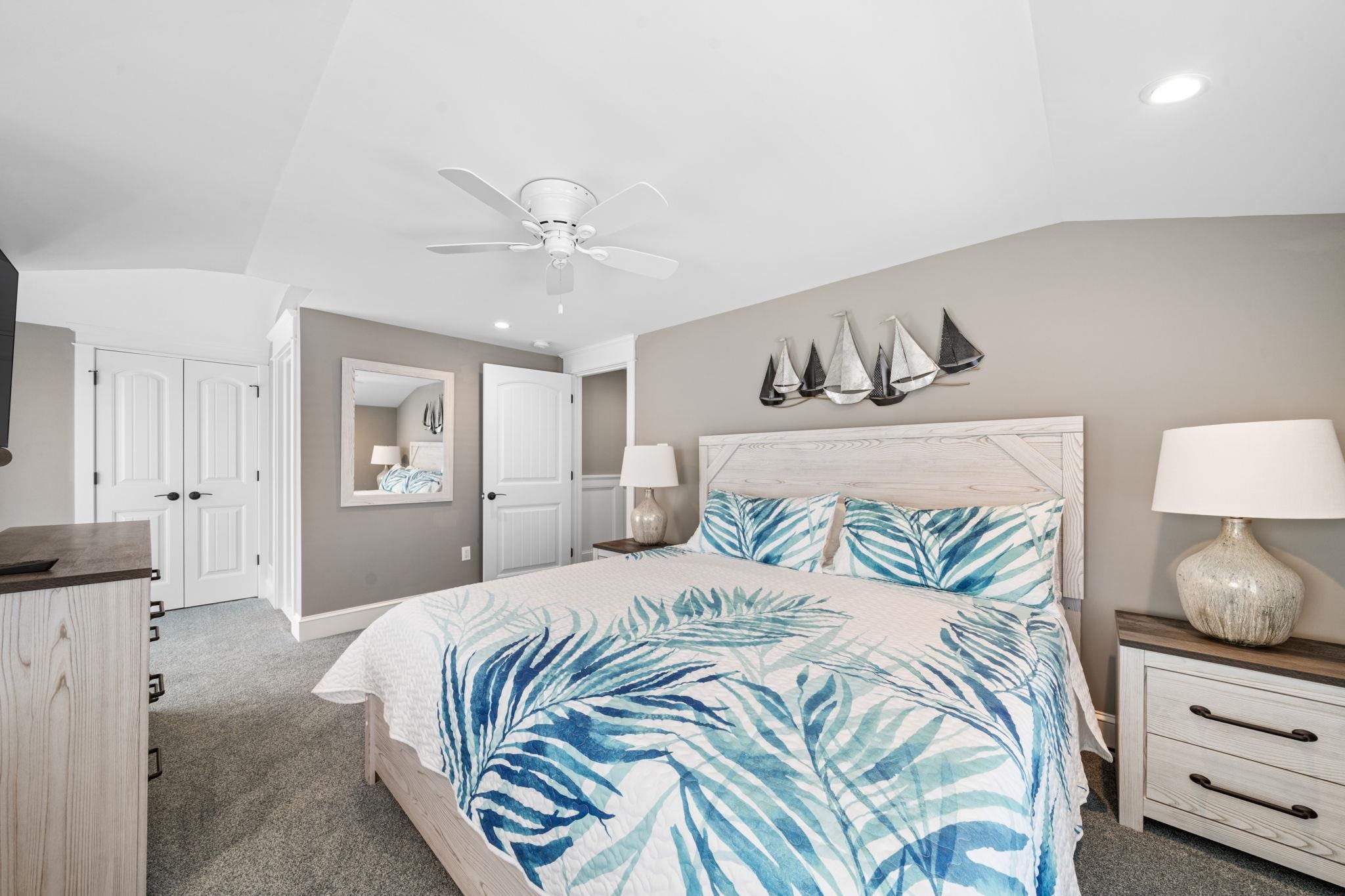 75 24th Street East Avalon, NJ 08202 - Photo 45 of 47 a bedroom with a bed and wooden floor