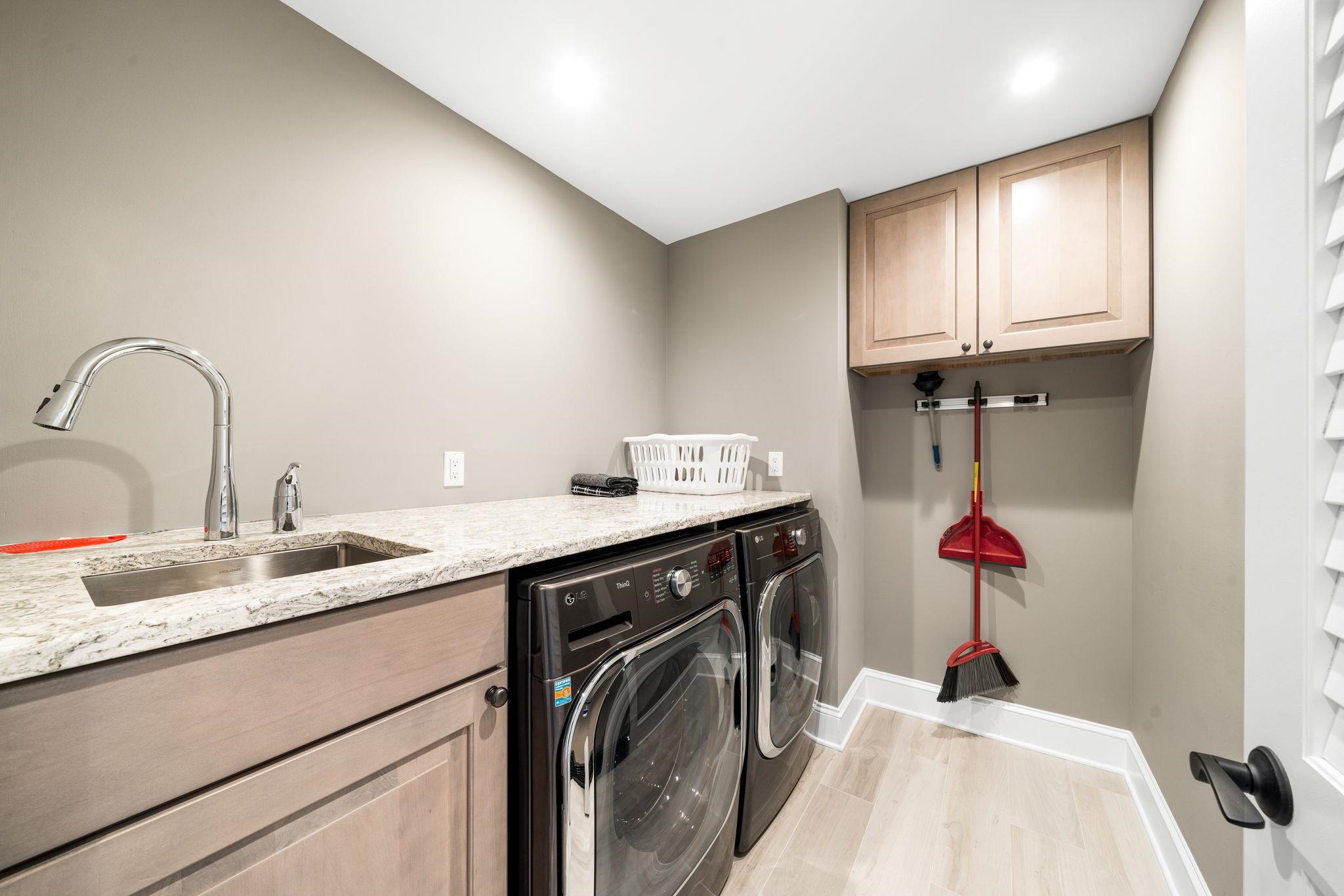 75 24th Street East Avalon, NJ 08202 - Photo 10 of 47 a kitchen with a sink and a stove top oven