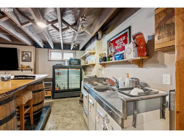 a kitchen with a stove and cabinets