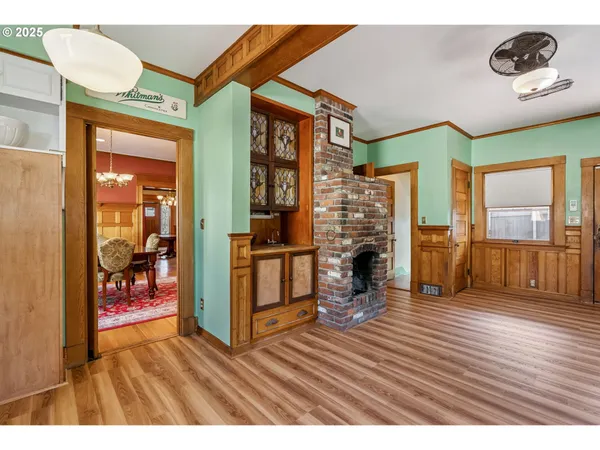 a view of an entryway with a hardwood floor
