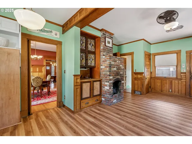 a view of an entryway with a hardwood floor