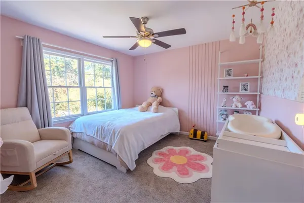 a bed room with a bed and a couch