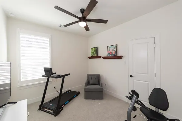 a view of workspace with gym equipment