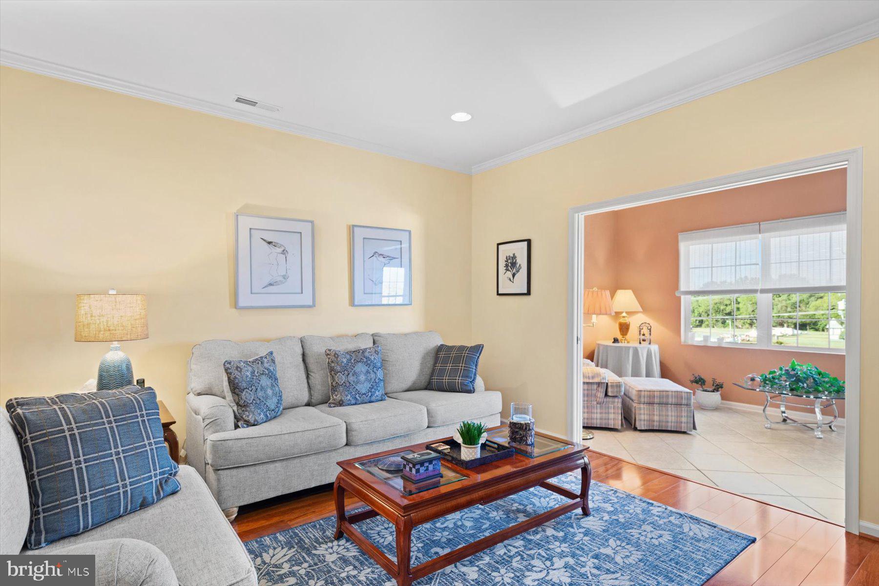 30413 Cedar Neck Road, Unit 309 Ocean View, DE 19970 - Photo 13 of 53 Living Room to Sunroom