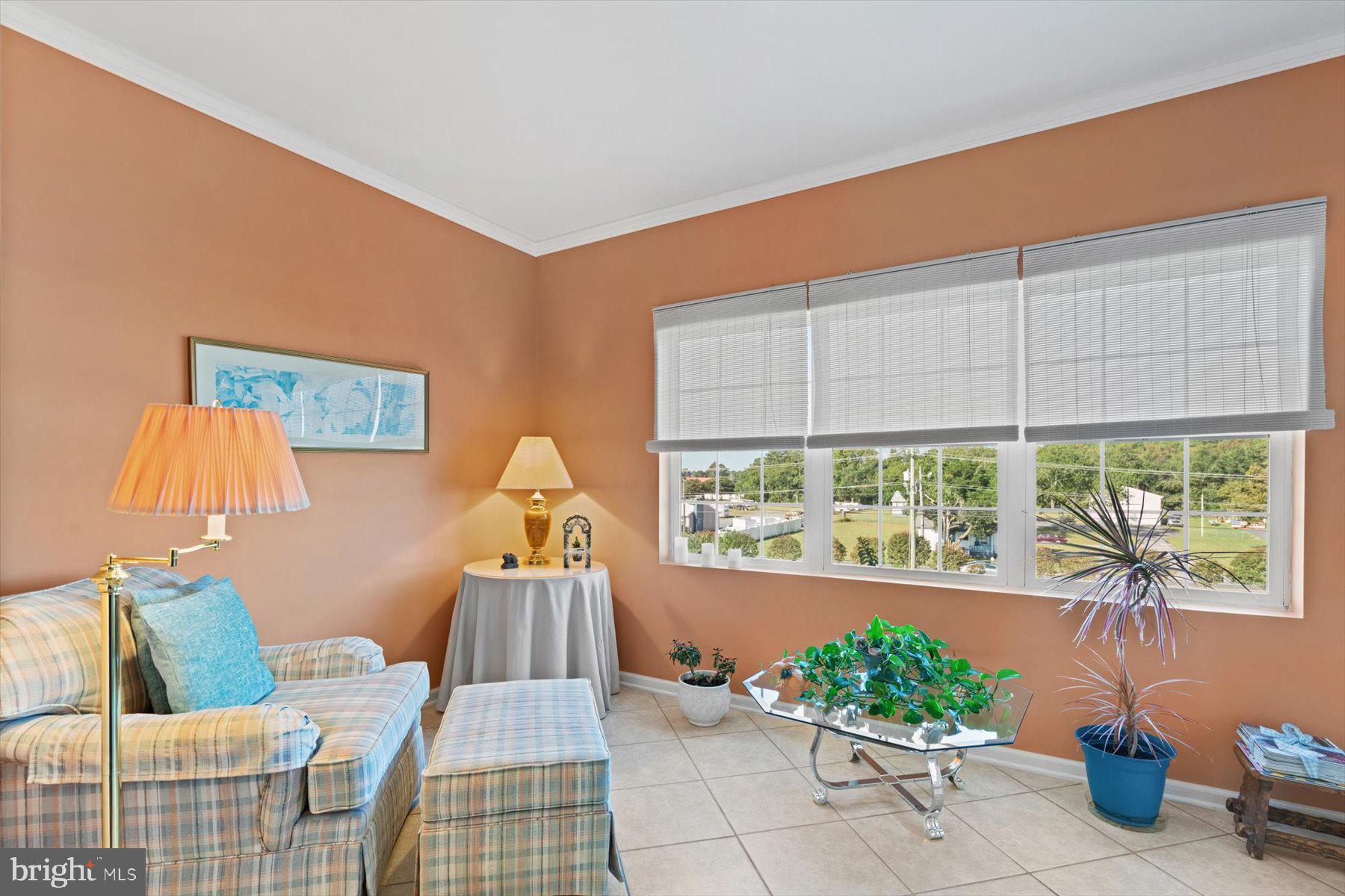 30413 Cedar Neck Road, Unit 309 Ocean View, DE 19970 - Photo 35 of 53 Sunroom