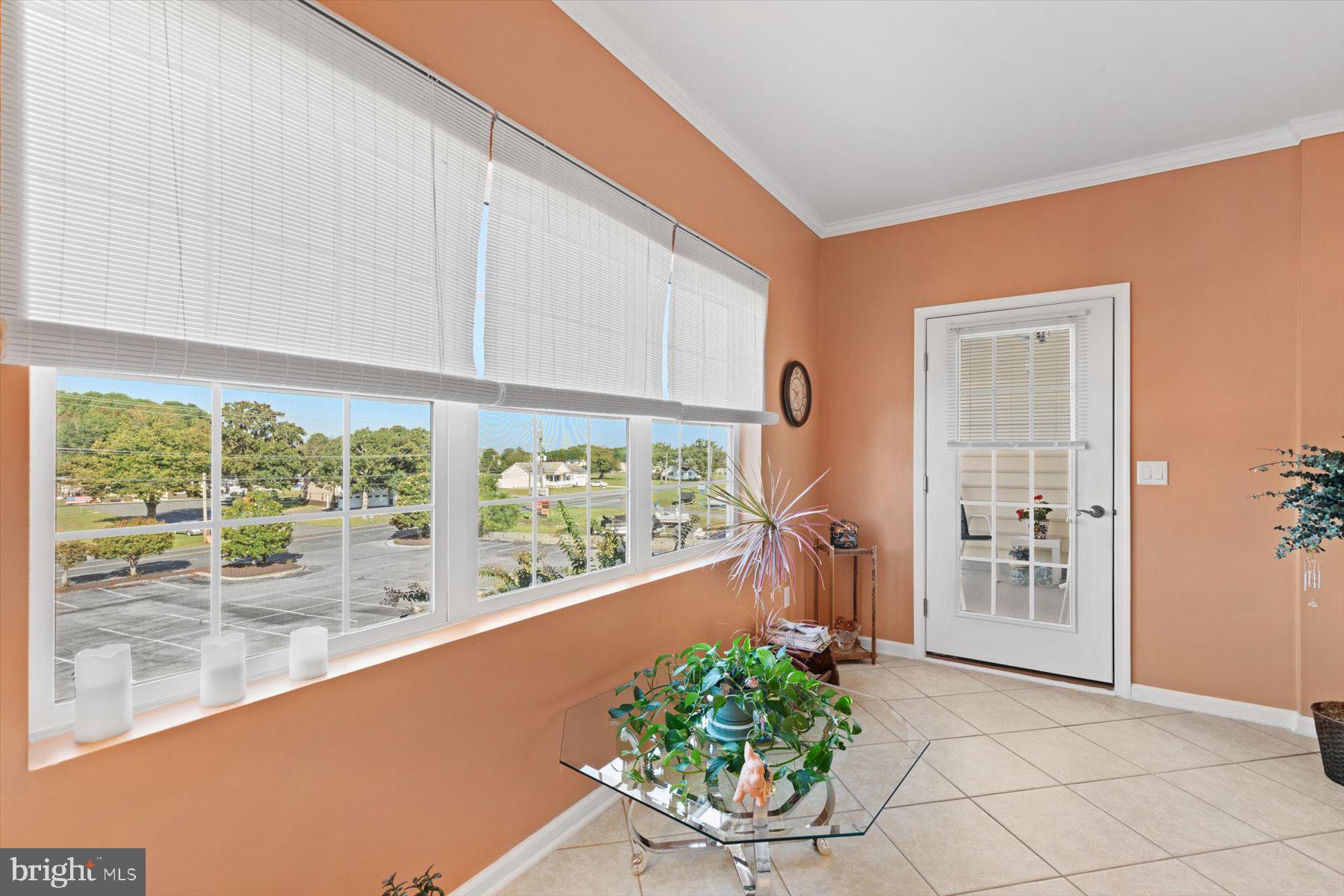 30413 Cedar Neck Road, Unit 309 Ocean View, DE 19970 - Photo 37 of 53 Sunroom