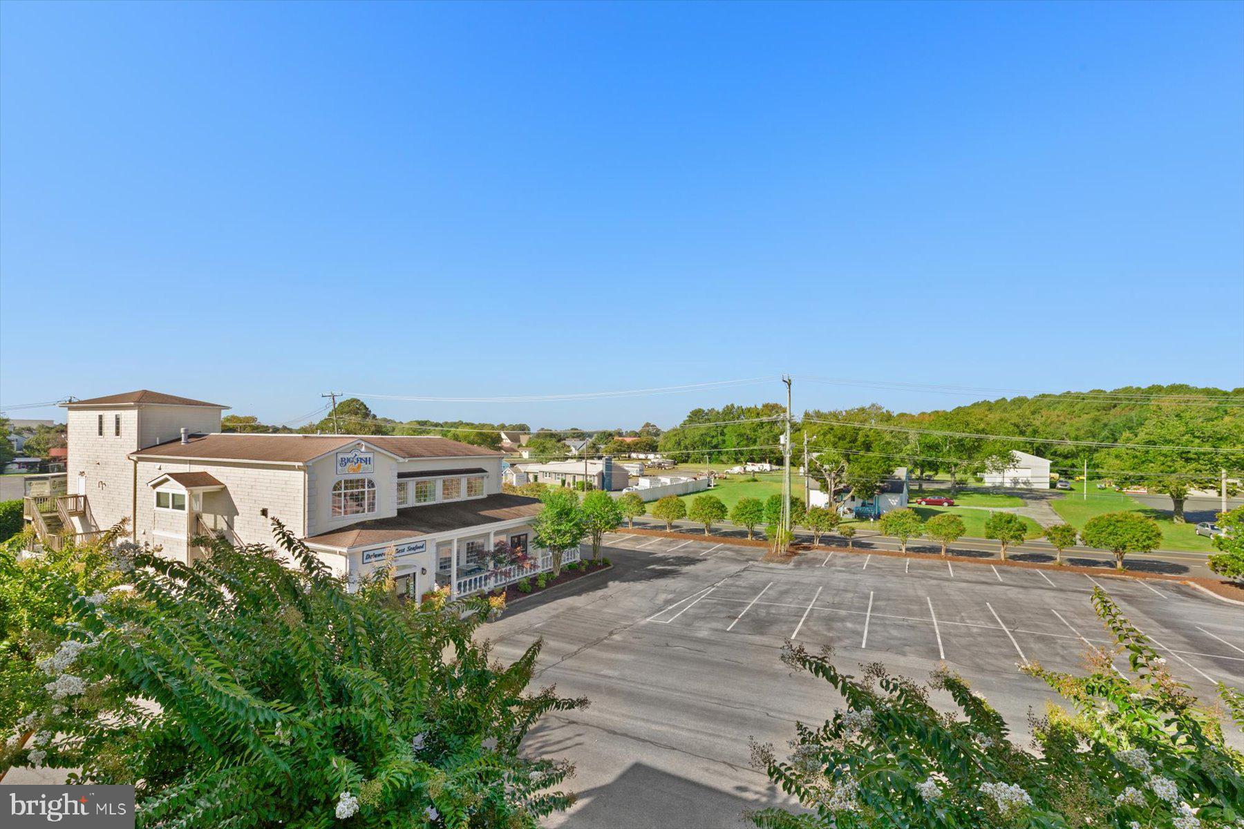 30413 Cedar Neck Road, Unit 309 Ocean View, DE 19970 - Photo 40 of 53 Big Fish Grill shares the Parking Lot!