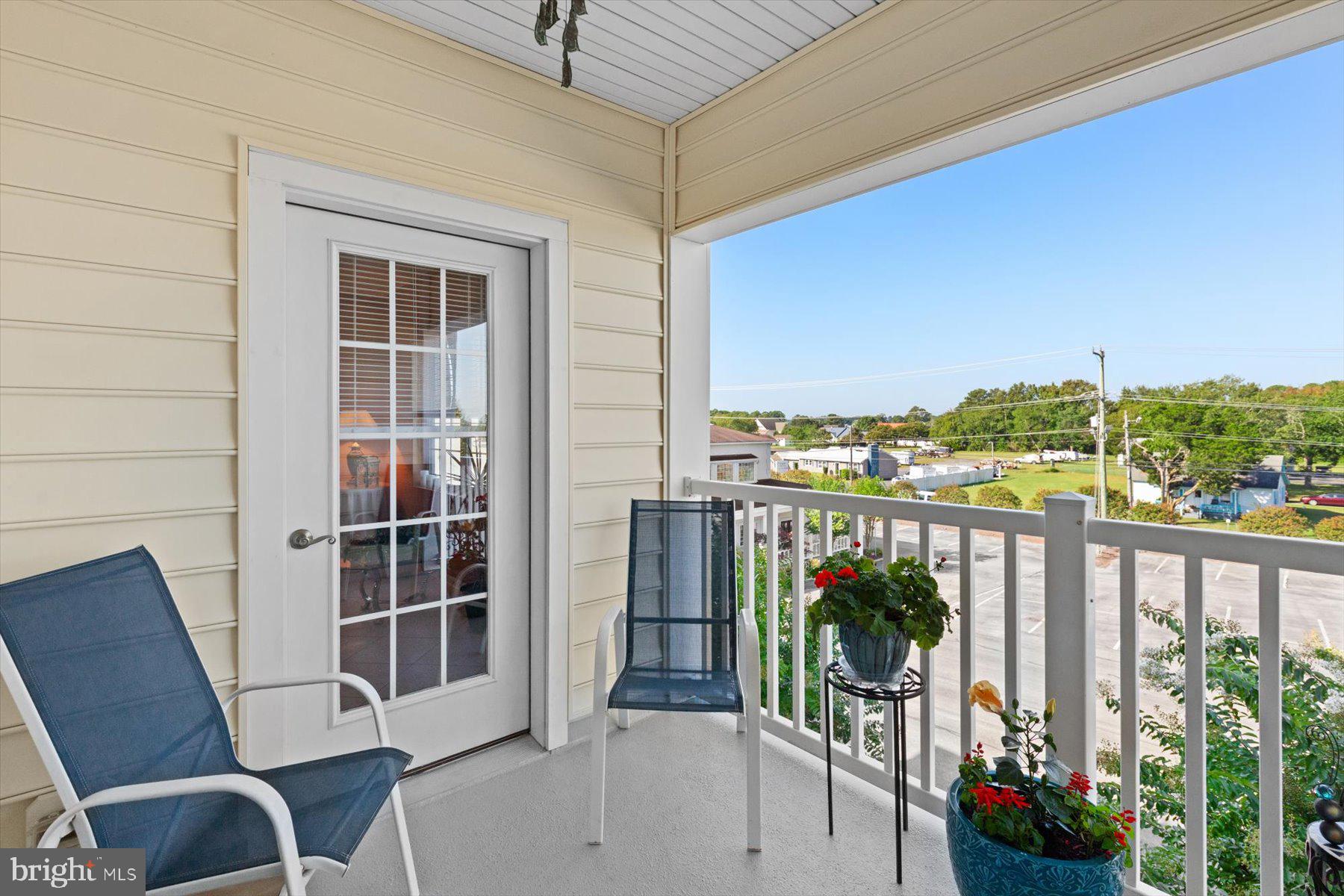 30413 Cedar Neck Road, Unit 309 Ocean View, DE 19970 - Photo 42 of 53 Open Deck with Seating