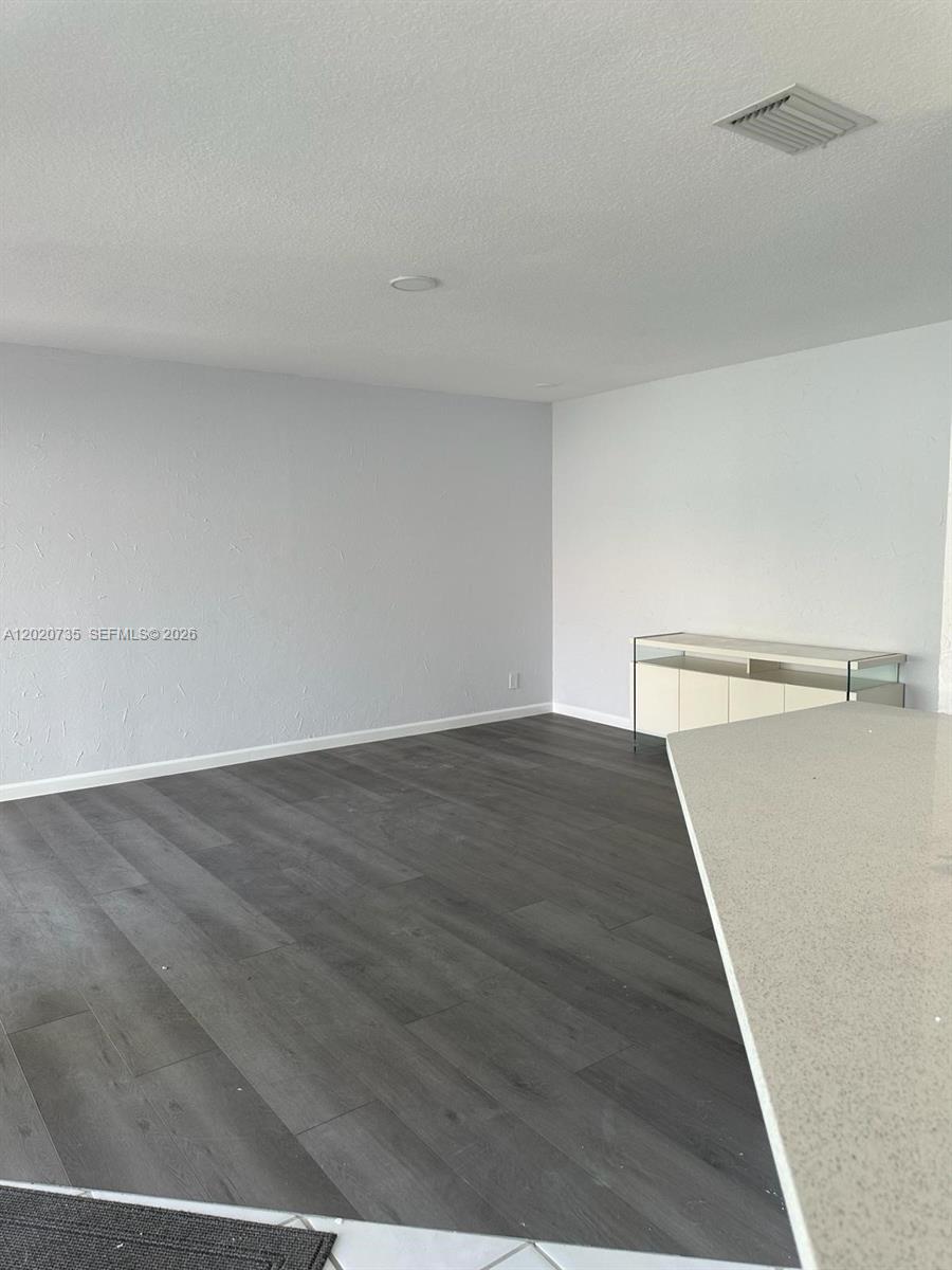 17244 Balboa Point Way Boca Raton, FL 33487 - Photo 9 of 66 a view of a big room with wooden floor
