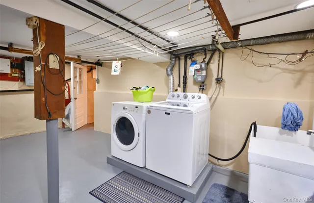 a view of a livingroom with furniture and a window