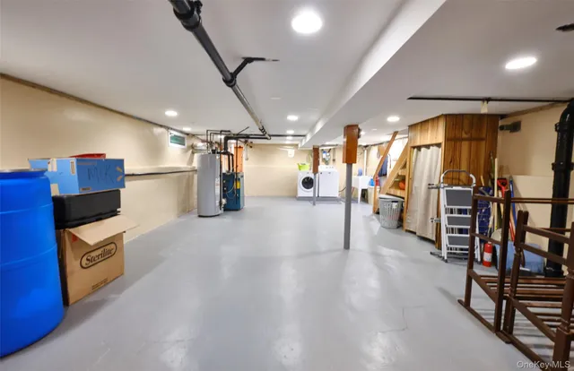 a bathroom with a shower and a sink