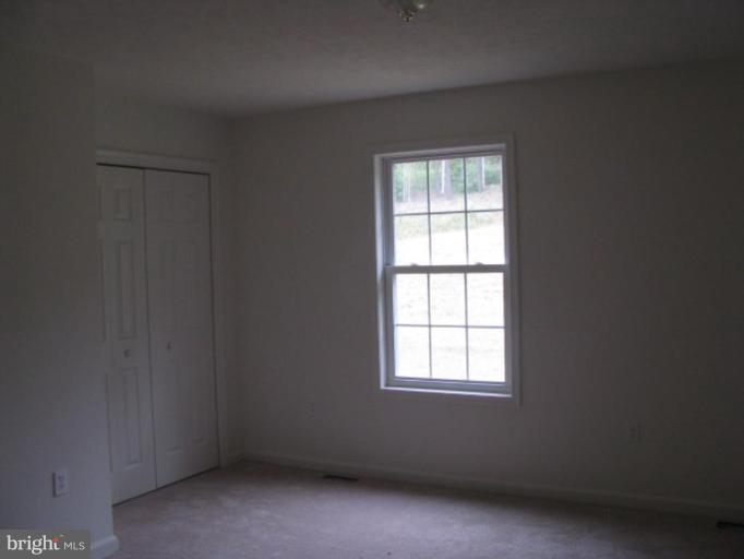 123 Martin Road Front Royal, VA 22630 - Photo 11 of 13 an empty room with a window