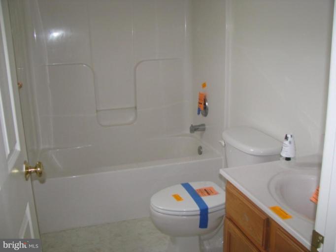 123 Martin Road Front Royal, VA 22630 - Photo 4 of 13 a bathroom with a sink a toilet and shower