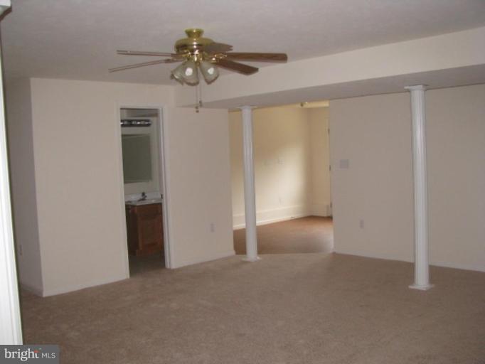 123 Martin Road Front Royal, VA 22630 - Photo 5 of 13 a view of an empty room with a window