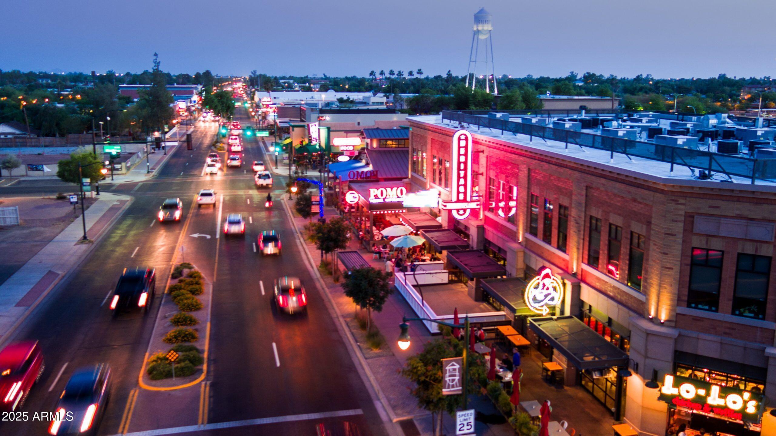 250 West Juniper Avenue, Unit 96 Gilbert, AZ 85233 - Photo 35 of 41 Downtown-Gilbert-at-Night-scaled