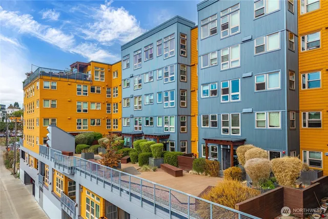 a front view of a building with glass windows