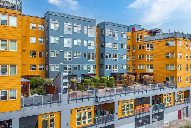a front view of a building with glass windows