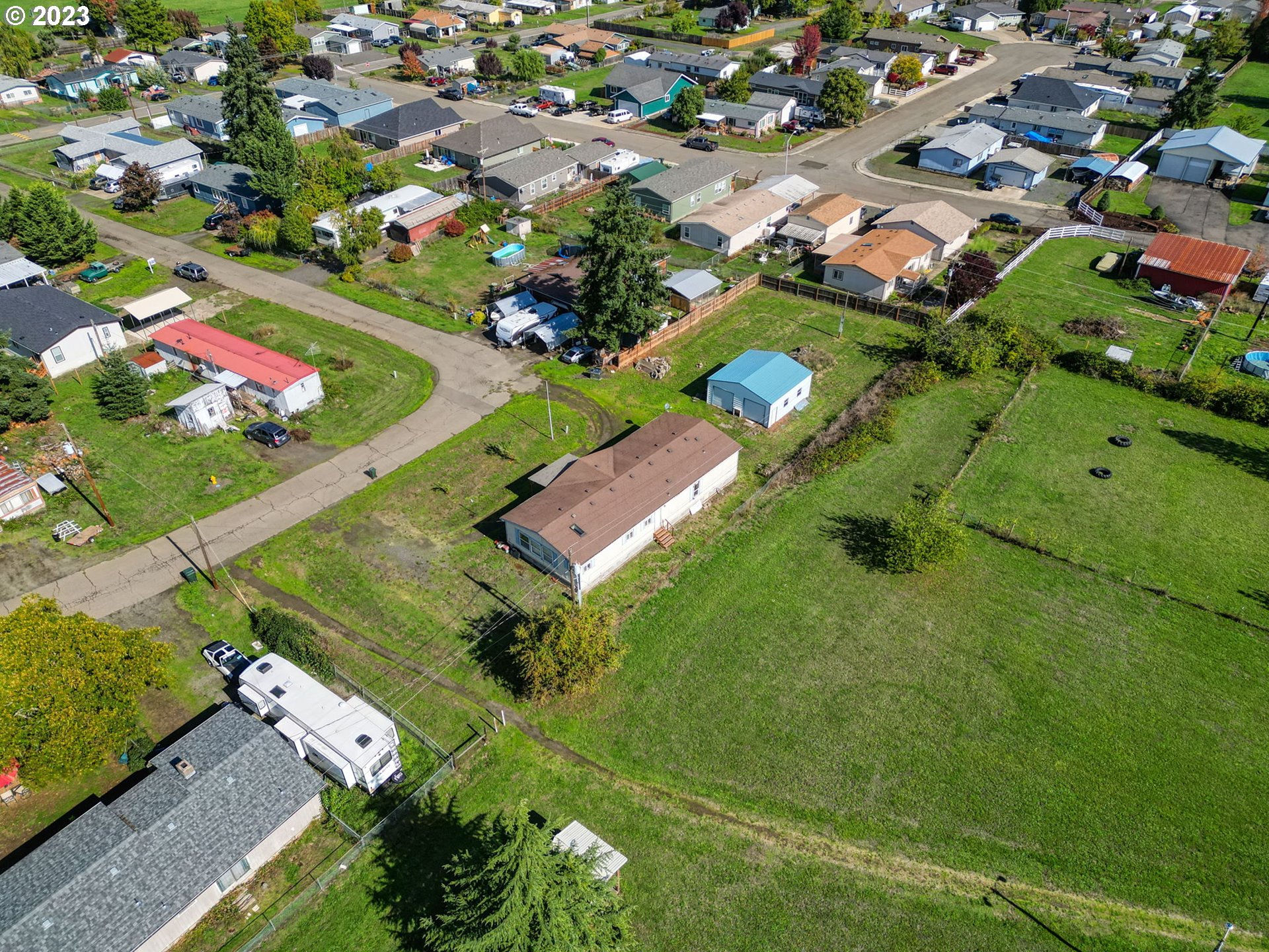 434 Locust Street Yoncalla, OR 97499 - Photo 11 of 36 an aerial view of a residential houses with outdoor space
