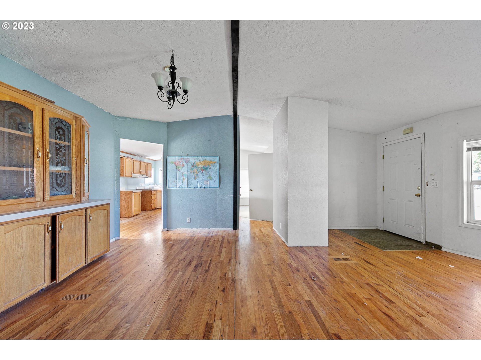 434 Locust Street Yoncalla, OR 97499 - Photo 16 of 36 a view of an empty room with window and wooden floor