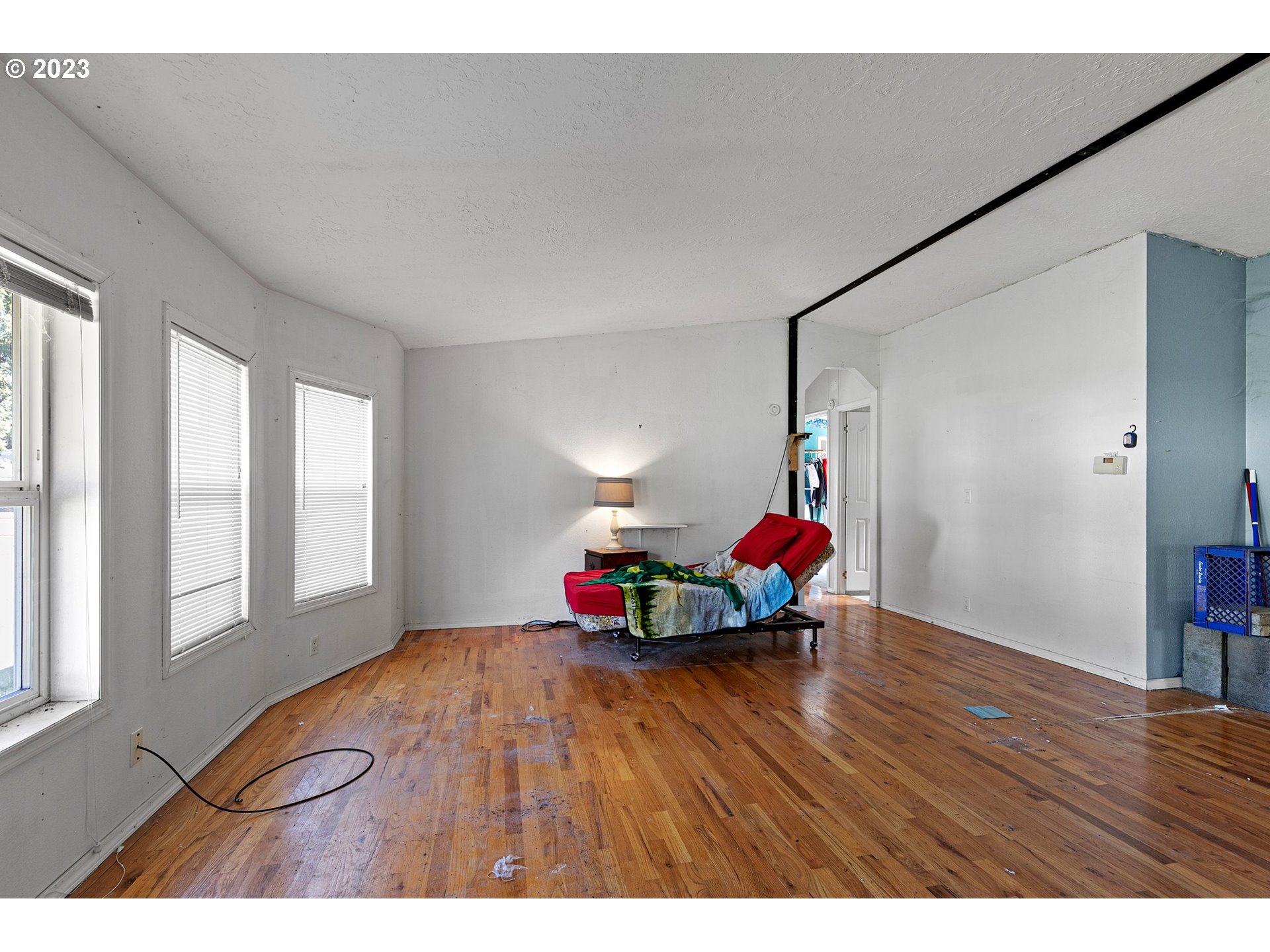 434 Locust Street Yoncalla, OR 97499 - Photo 17 of 36 a living room with furniture and a wooden floor