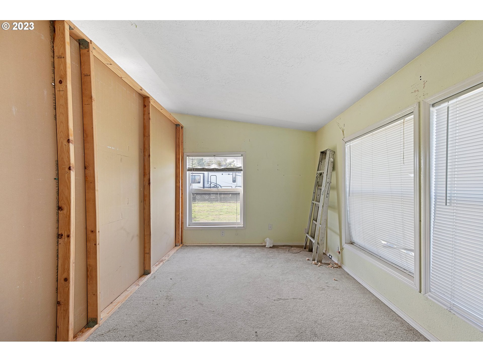 434 Locust Street Yoncalla, OR 97499 - Photo 21 of 36 a view of empty room with windows