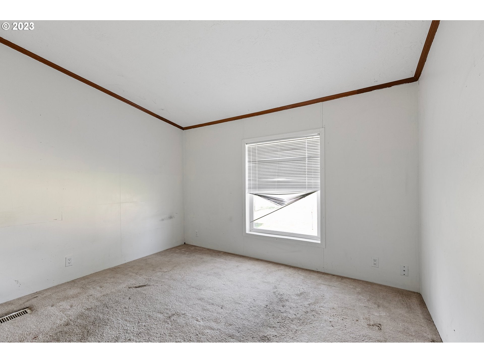 434 Locust Street Yoncalla, OR 97499 - Photo 23 of 36 a view of an empty room with a window