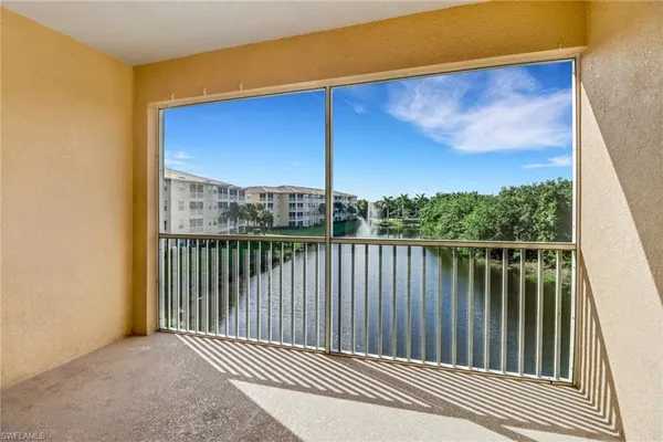 a view of a balcony with an outdoor space