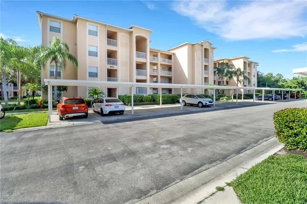 a cars parked in front of a building