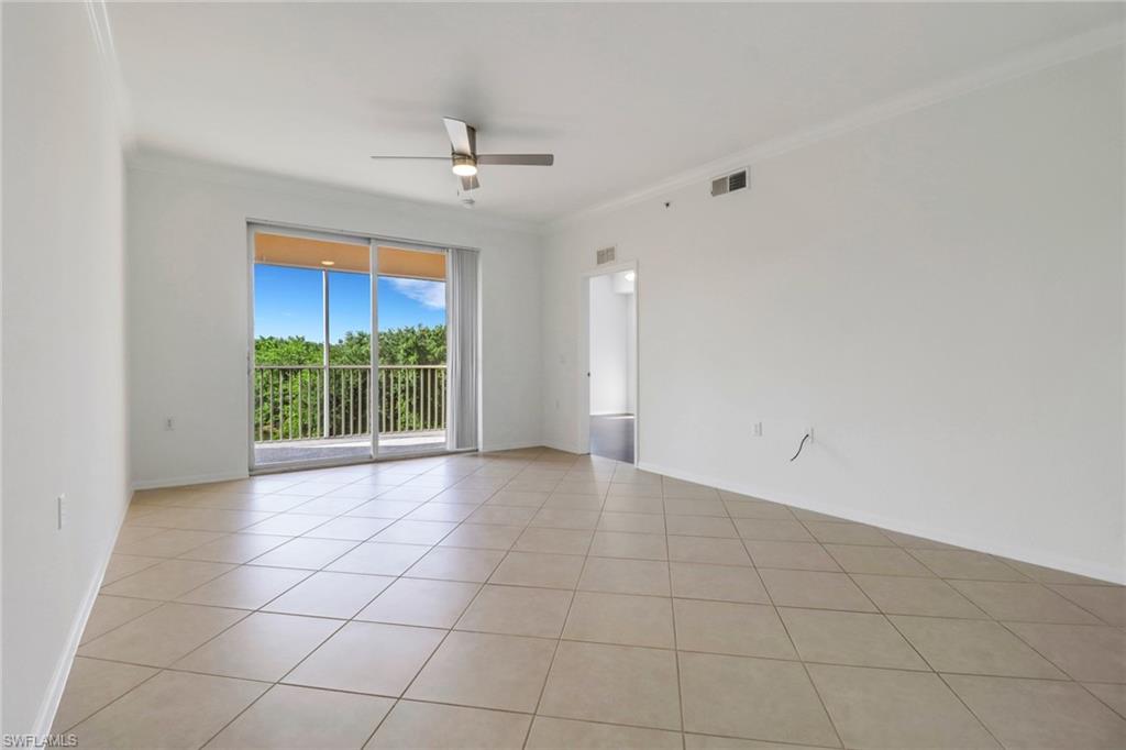 8451 Kingbird Loop, Unit 334 Estero, FL 33967 - Photo 7 of 26 a view of an empty room with a window