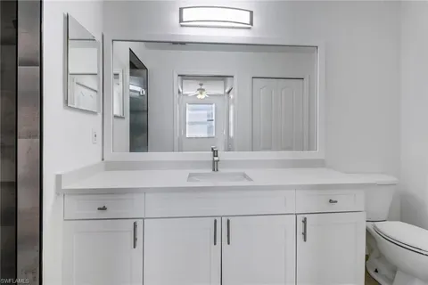 a bathroom with a sink and a toilet