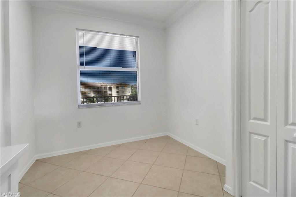 8451 Kingbird Loop, Unit 334 Estero, FL 33967 - Photo 10 of 26 a view of an empty room with a window