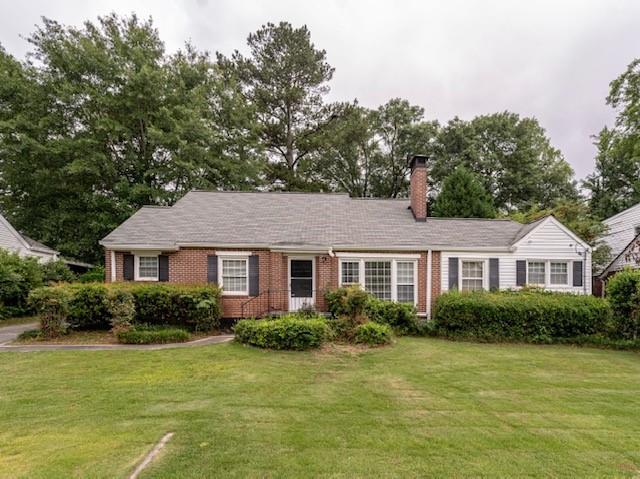 2428 North Decatur Road Decatur, GA 30033 - Photo 1 of 1 a front view of house with yard and green space